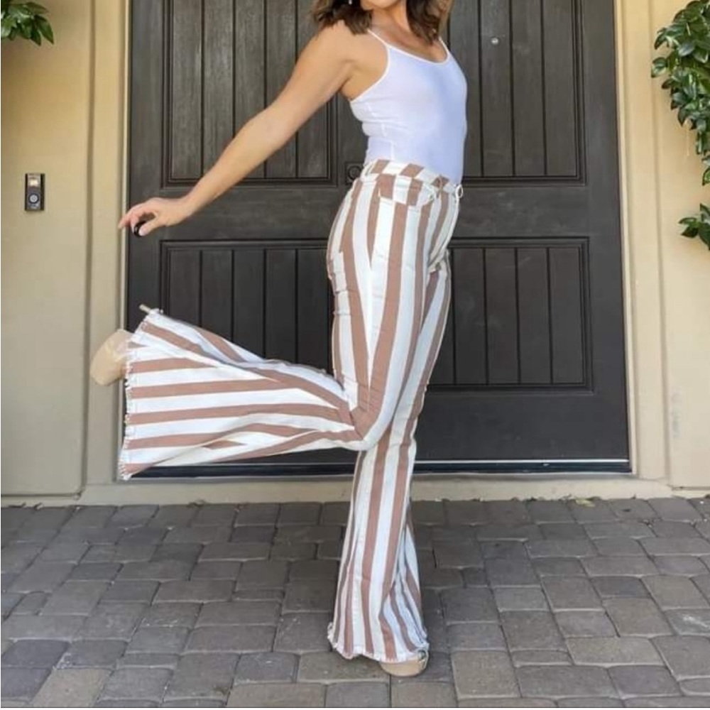 Striped bell bottom jeans